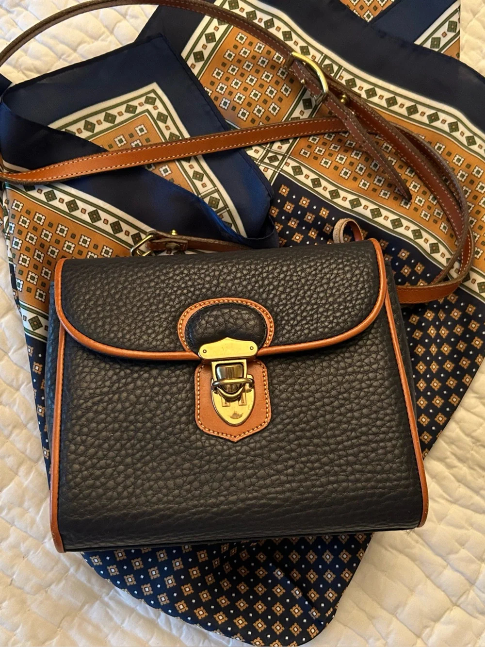 Structured Navy Dooney&Bourke Crossbody Bag with Tan Trim and Gold Accent